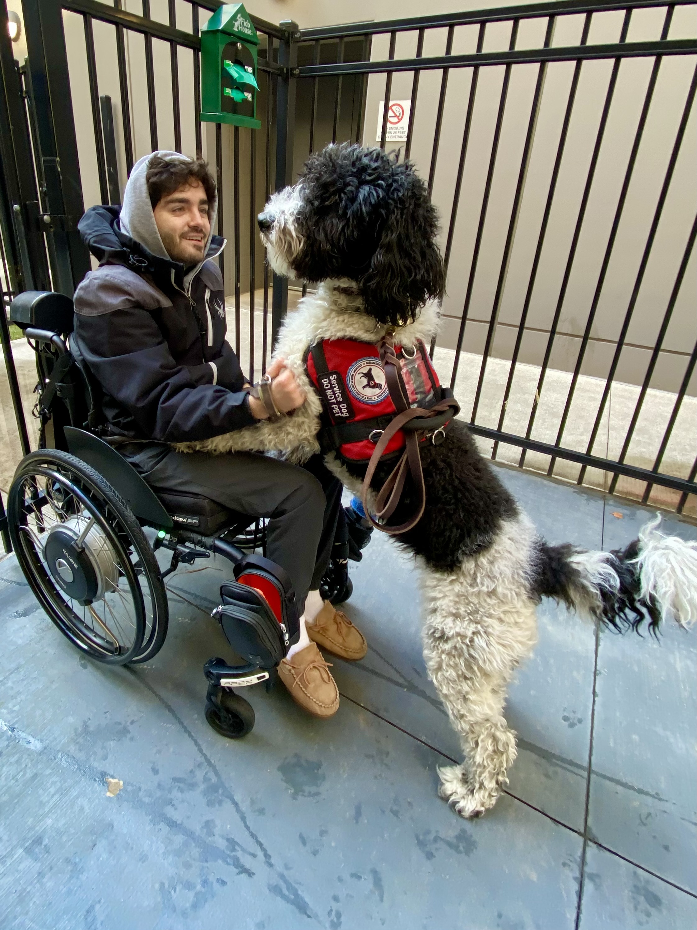 Steh with his service dog, Noel