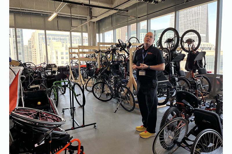 Therapeutic Recreation Manager Mike Wehner pictured in Shirley Ryan AbilityLab’s adaptive cycling workshop