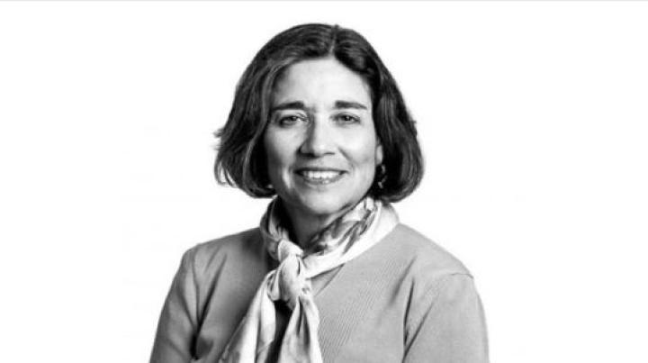 black and white photo of Linda Ehrlich-Jones, a middle aged white woman with short black hair.