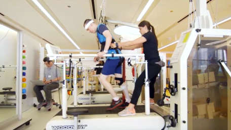 Ryan walking on a treadmill after his stroke